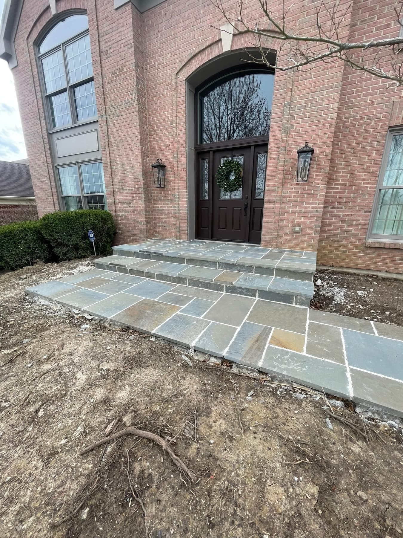 Trademark Outdoor Services bluestone front walk and entrance in Edgewood, KY