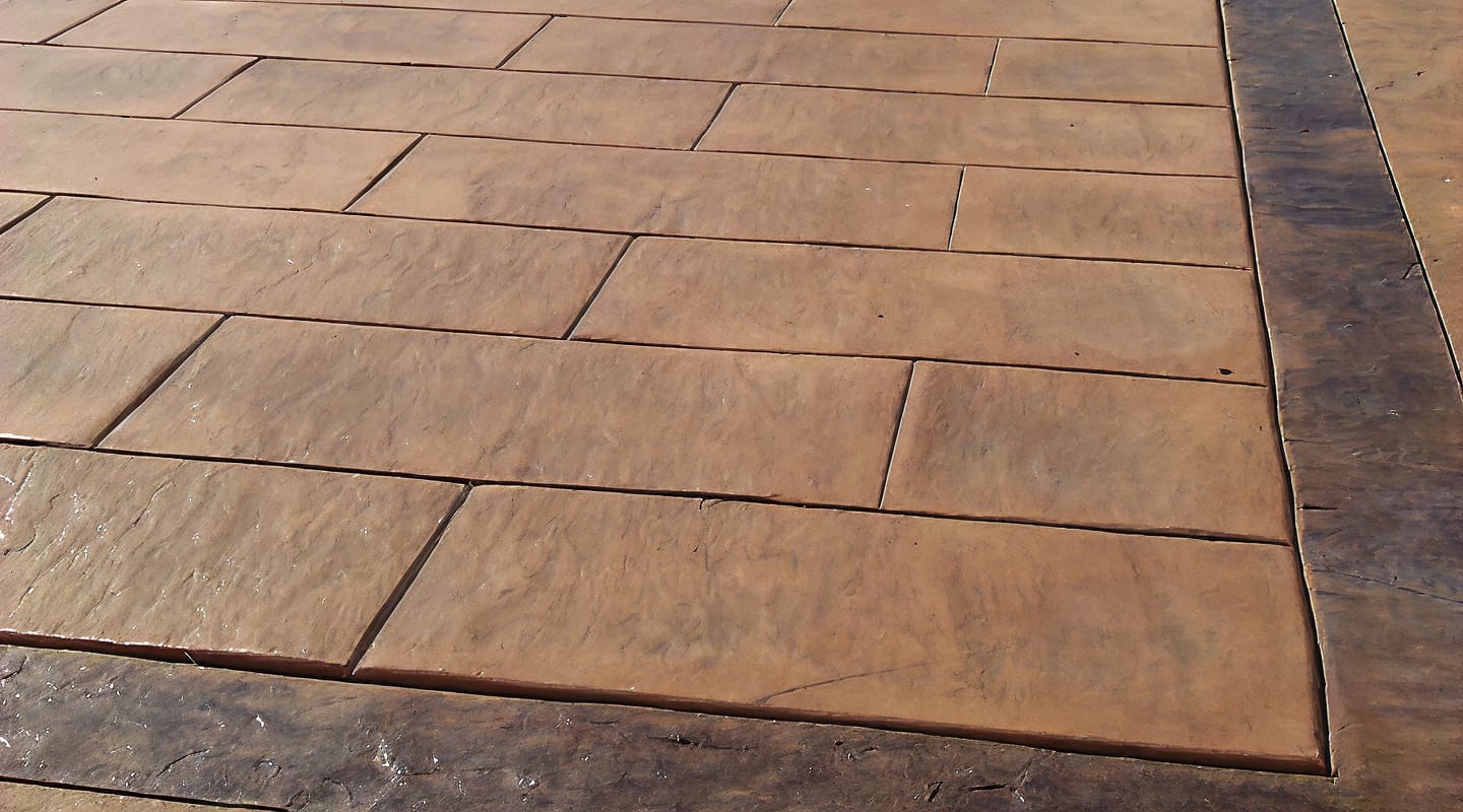 Premium stamped concrete patio with outdoor living space
